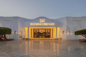 a lobby of a hotel with a sign that reads shimimi drive ms at JAZ Sharm Dreams in Sharm El Sheikh