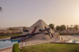a playground in a resort with a slide at JAZ Sharm Dreams in Sharm El Sheikh