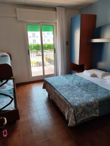 Postel nebo postele na pokoji v ubytování Hotel Trifoglio + 37 fotografií