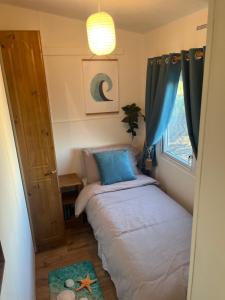 Postel nebo postele na pokoji v ubytování Seaside Sonas