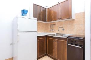 Kuchyň nebo kuchyňský kout v ubytování Apartments Marko