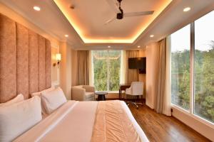 Postel nebo postele na pokoji v ubytování Claret Inn & Suites - Dalhousie