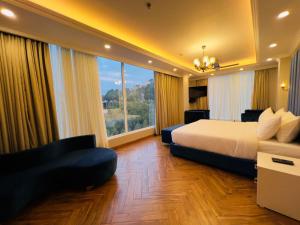 Postel nebo postele na pokoji v ubytování Claret Inn & Suites - Dalhousie
