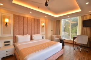 Postel nebo postele na pokoji v ubytování Claret Inn & Suites - Dalhousie