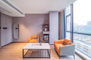 Area soggiorno di ChongQing Could Hotel 重庆云禧酒店