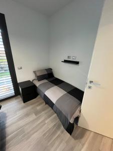 Postel nebo postele na pokoji v ubytování Casa Darcellas trilocale in a4 con giardino