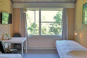 Postel nebo postele na pokoji v ubytování Flinten Horsens