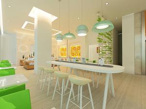 a room with a bar with stools in it at Zest Ambon by Swiss-Belhotel International in Ambon