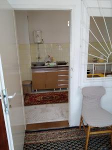 Kuchyň nebo kuchyňský kout v ubytování Home in flowers