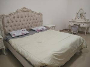 Letto o letti in una camera di Al Khor Tower Apartment