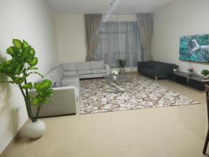 Area soggiorno di Al Khor Tower Apartment