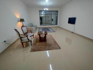 Area soggiorno di Al Khor Tower Apartment