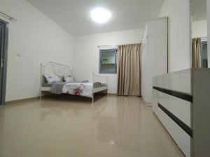 Letto o letti in una camera di Al Khor Tower Apartment