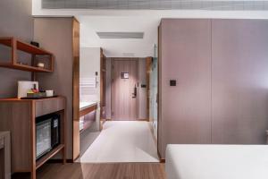 Letto o letti in una camera di ChongQing Could Hotel 重庆云禧酒店
