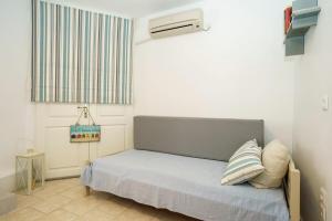 a bedroom with a bed in a room at Nostos in Hydra