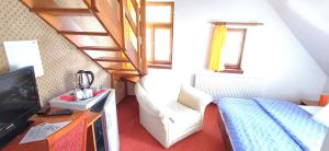 Postel nebo postele na pokoji v ubytování Wellness & Sport Hotel TTC