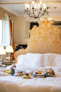 Giường trong phòng chung tại Hotel d’Inghilterra Roma – Starhotels Collezione