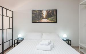 Postel nebo postele na pokoji v ubytování Travelershome Ciampino Suite