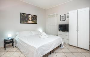 Postel nebo postele na pokoji v ubytování Travelershome Ciampino Suite