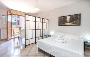 Postel nebo postele na pokoji v ubytování Travelershome Ciampino Suite