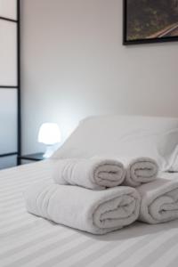 Postel nebo postele na pokoji v ubytování Travelershome Ciampino Suite