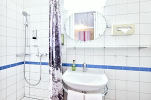 Un baño de Steinenschanze Charming City & Garden Hotel