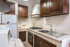 Kuchyň nebo kuchyňský kout v ubytování Travelershome Ciampino Suite