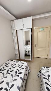 Postel nebo postele na pokoji v ubytování Konyaaltı tatil evleri & konaklama Türkiye - Antalya