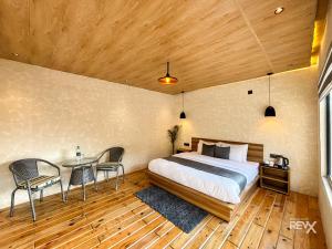 Postel nebo postele na pokoji v ubytování Anupraas Resort