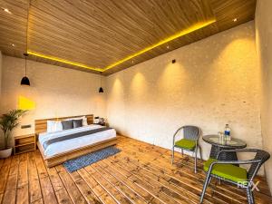 Postel nebo postele na pokoji v ubytování Anupraas Resort