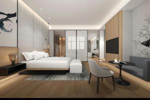 A bed or beds in a room at Fairfield by Marriott Shanghai Hongqiao