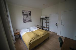 A bed or beds in a room at Hotel Isafjordur - Horn