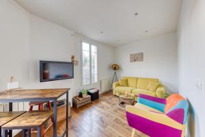 Et opholdsområde på Le Sympathique - Metro 7 à 4 minutes - Direction Paris