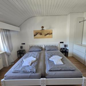 Postel nebo postele na pokoji v ubytování work & stay house in Linz
