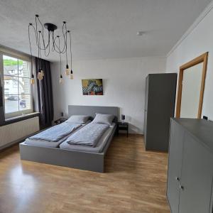 Postel nebo postele na pokoji v ubytování work & stay house in Linz