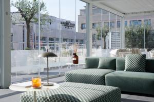 A seating area at Magna Pars l'Hotel à Parfum, Small Luxury Hotels of the World