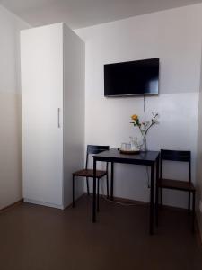 TV a/nebo společenská místnost v ubytování Work Home