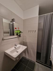 Koupelna v ubytování Work Home + 3 fotografie