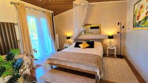 a bedroom with a bed and a large window at Avalena Residence in Zadar +19 photos