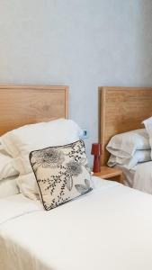 Un ou plusieurs lits dans un hébergement de l'établissement Chez Abel