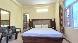 Postel nebo postele na pokoji v ubytování Himalayan Home Stay Dalhousie
