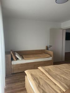 Postel nebo postele na pokoji v ubytování Apartments Wally
