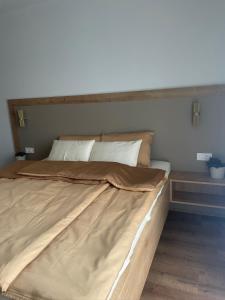 Postel nebo postele na pokoji v ubytování Apartments Wally