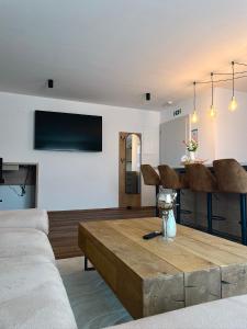 TV a/nebo společenská místnost v ubytování Apartments Wally