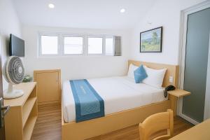 Voodi või voodid majutusasutuse Tuan Thuy Hotel toas