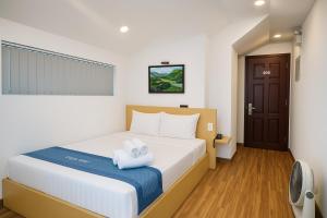 Voodi või voodid majutusasutuse Tuan Thuy Hotel toas