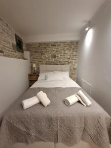 Ένα ή περισσότερα κρεβάτια σε δωμάτιο στο Rousa village house