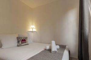 Ένα ή περισσότερα κρεβάτια σε δωμάτιο στο Prarion Lac - Pied des pistes - Vue montagne