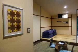 Ein Sitzbereich in der Unterkunft YuYu Hakone - Private Open Air Onsen Usage Guaranteed