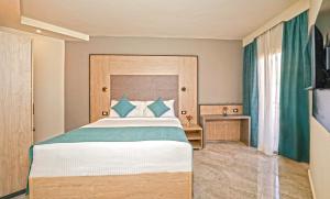 Кровать или кровати в номере Xperience Kiroseiz Parkland